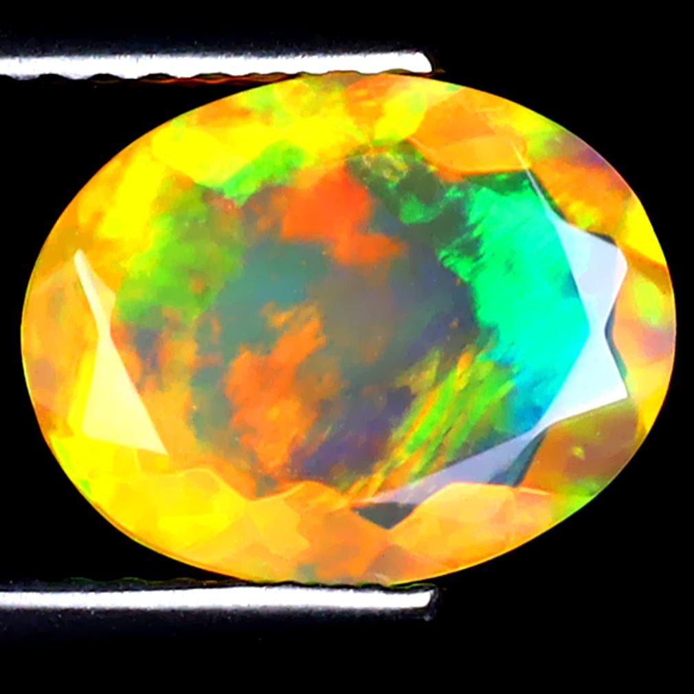 1.42 ct First-class Oval (10.52 x 8.32 mm) Ethiopian Rainbow Opal Stone