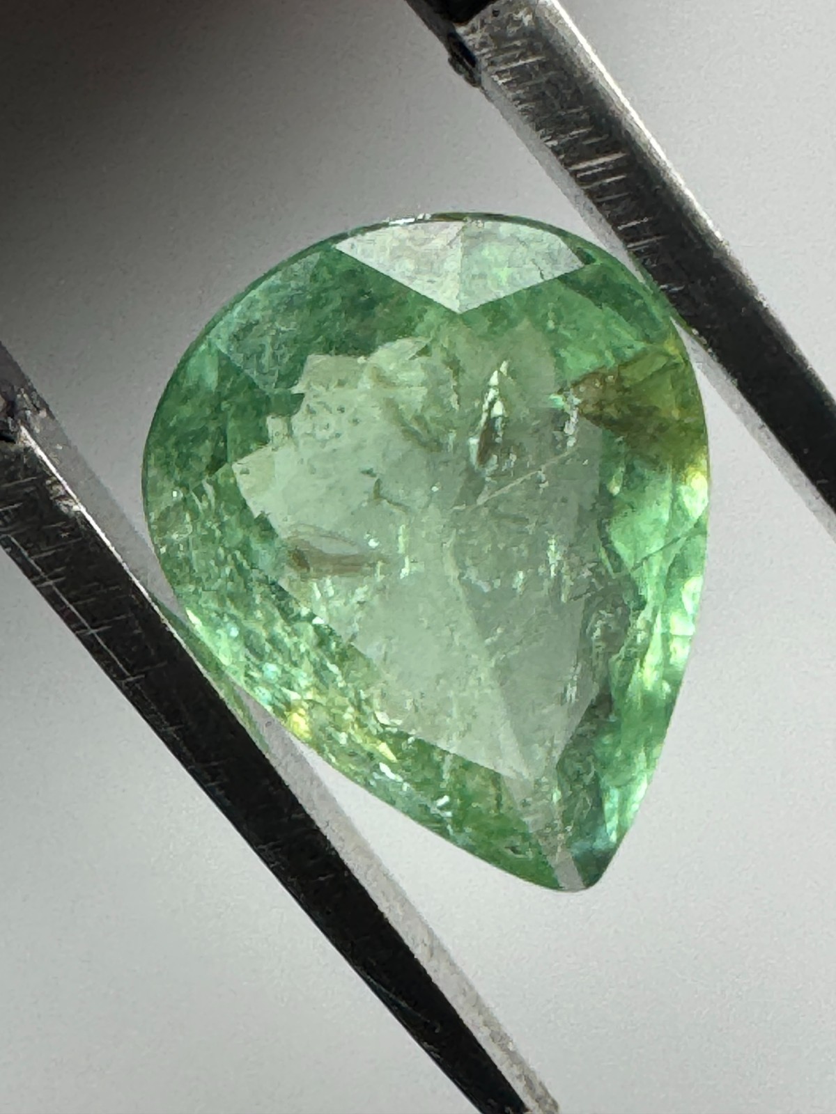 GIA PARAIBA TOURMALINE. 1.60 Carat, Yellowish Green Pear, 9.11 x 7.04 x 4.08 mm